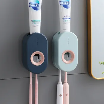 חדש דבק אוטומטי משחת שיניים מסחטת סט מברשת שיניים מתלה קיר יניקה מסחטת משחת שיניים הקיר משחת שיניים בעל