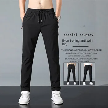 גברים של מכנסיים אביב הקיץ החדש דק שחור צבע מוצק אופנה כיס אפליקציה באורך מלא מזדמן מכנסי העבודה Pantalon